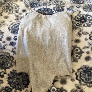 Grey micro thong bodysuit
